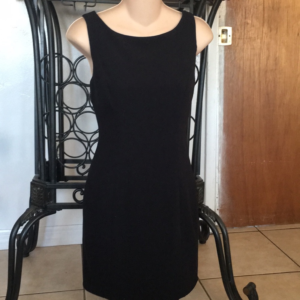 Little black dress with bow and zipper behind